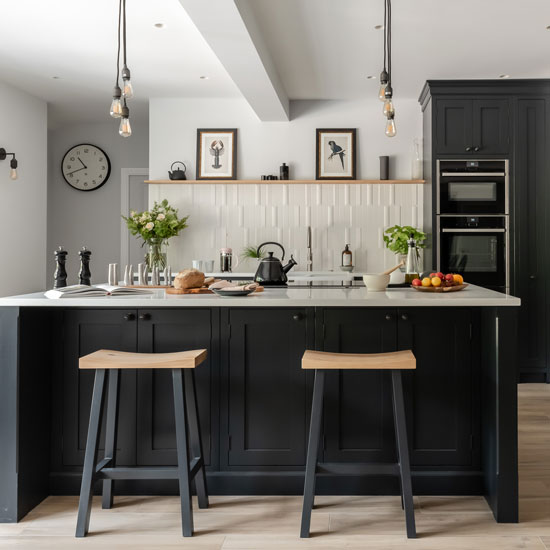 The Dene Kitchen - Luxuriously dark kitchen cabinetry, light worktops and walls with a spacious feel