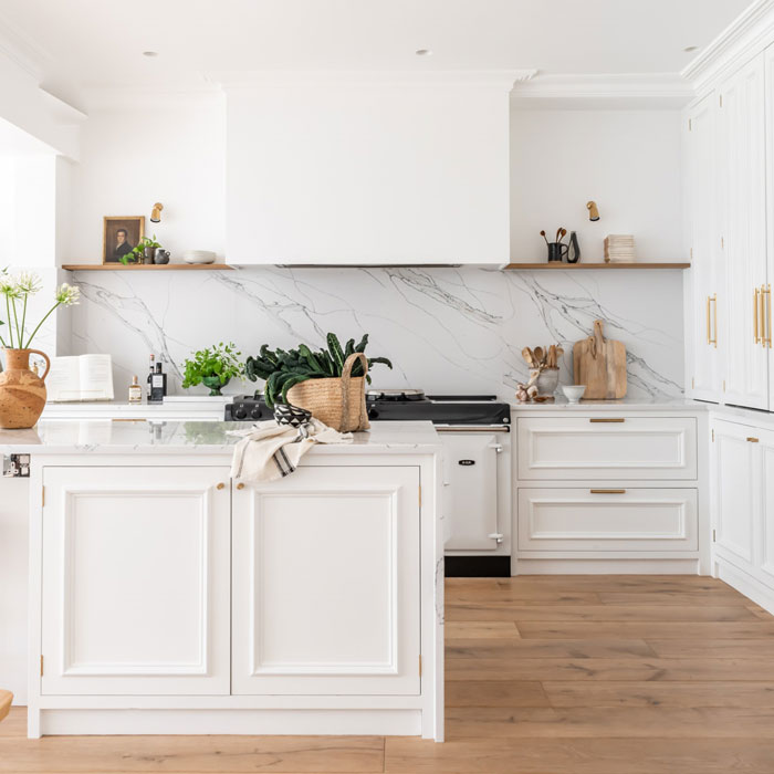The London Town House Kitchen - Elegant with easy living vibes, this refined white kitchen has lots of custom storage, food prep areas and places to sit with family and friends.