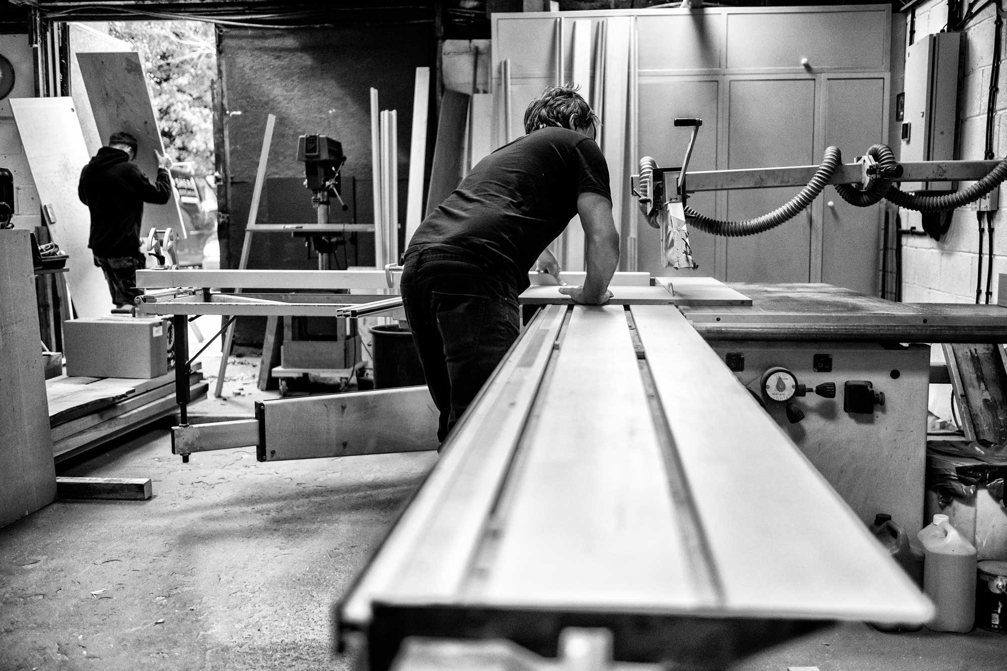 Shere Kitchens Team handcrafting kitchens in the workshop in Shere Guildford Surrey