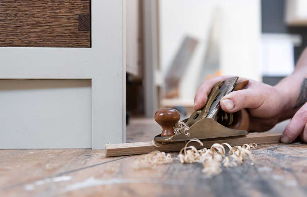 Hand crafting a bespoke kitchen in Guildford workshop